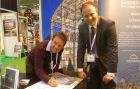 Charlie Groves signs for a new Smiemans building